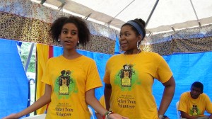 Alexis and Asia explain details about their Safari Teen Village at the St. Louis African Arts Festival, May 26, 2014. Photo by Lin. Woods