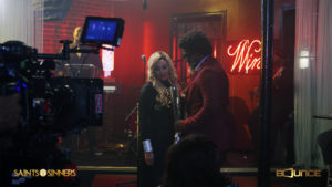 KeKe Wyatt (Lady Greene) talks with David Banner (Pastor Greene), her husband on Bounce TV's Saints & Sinners. 