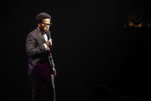 D.L. Hughley, host of Urban One Honors sharing a moment with audience in inaugural show.