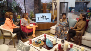 Photo of A.J. Johnson, host and life coach on set of TV One show Life Therapy.