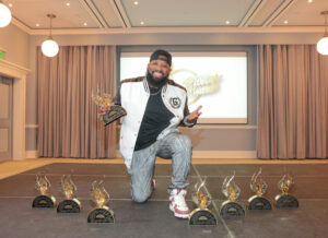 Pastor Mike Jr poses with his 9 Stellar Awards